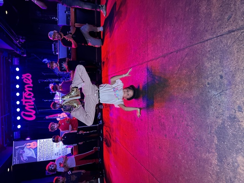 B-Girl Rebel doing a headstand